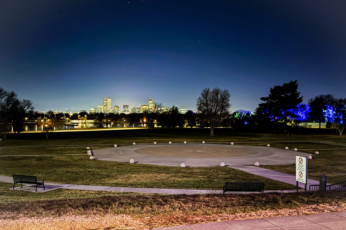 Denver skyline at night, photographed from the steps of the Denver Museum of Nature and Science.